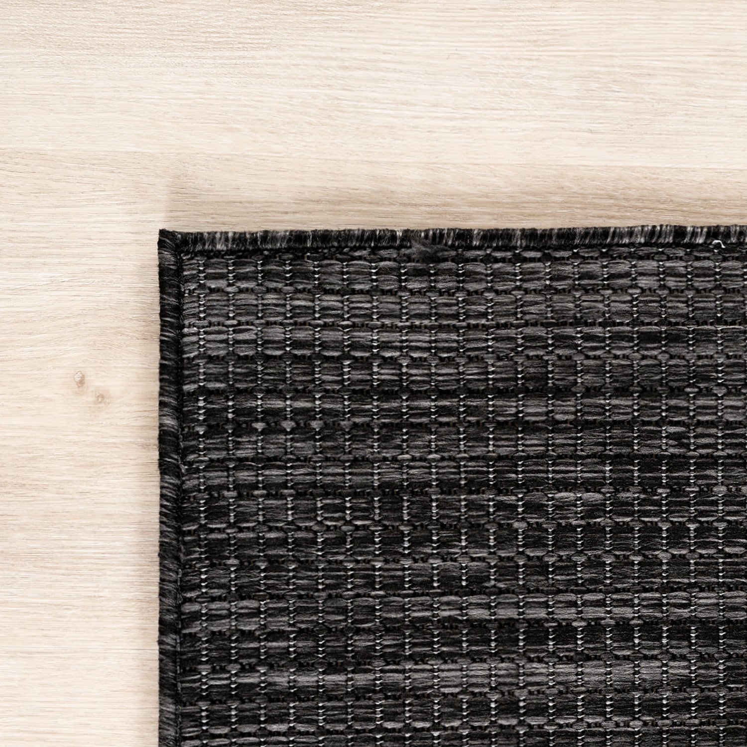 MIRA1450BLACK-R 05 Detail — Rond Buitenkleed - Mira Raster Zwart